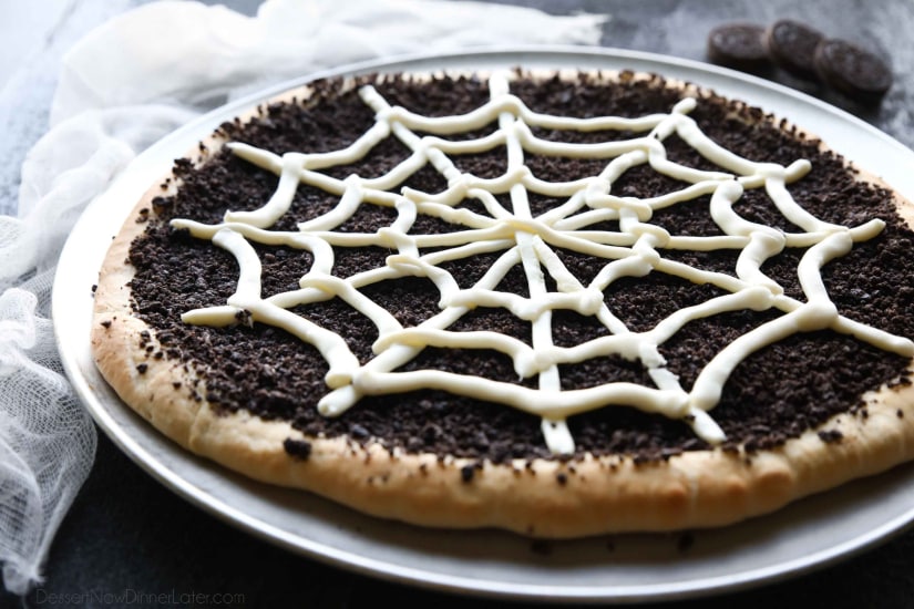 This Cobweb Oreo Dessert Pizza is an easy and fun Halloween party food that will be enjoyed by guests of all ages.