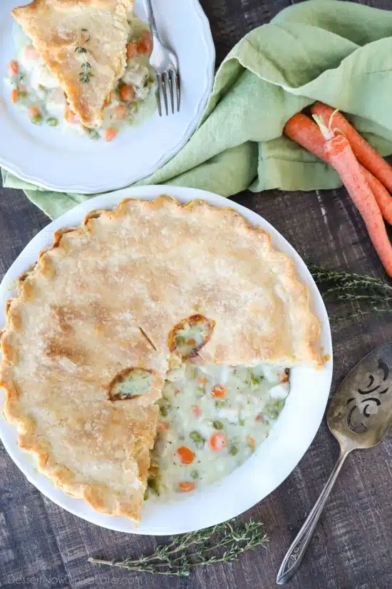 This classic Chicken Pot Pie is made from scratch with a creamy and flavorful chicken and vegetable filling tucked inside of a flaky pastry crust. Homemade comfort food that the whole family loves!