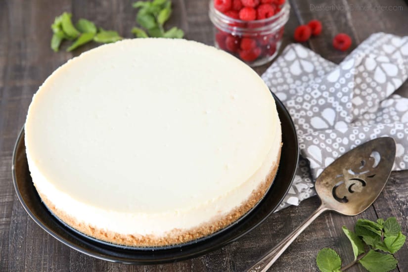 This Classic Cheesecake recipe is smooth, creamy, moist, and full of vanilla, with a graham cracker crust. Plus all the tips and tricks for the perfect cheesecake with no cracks! A great dessert for the holidays or any occasion.