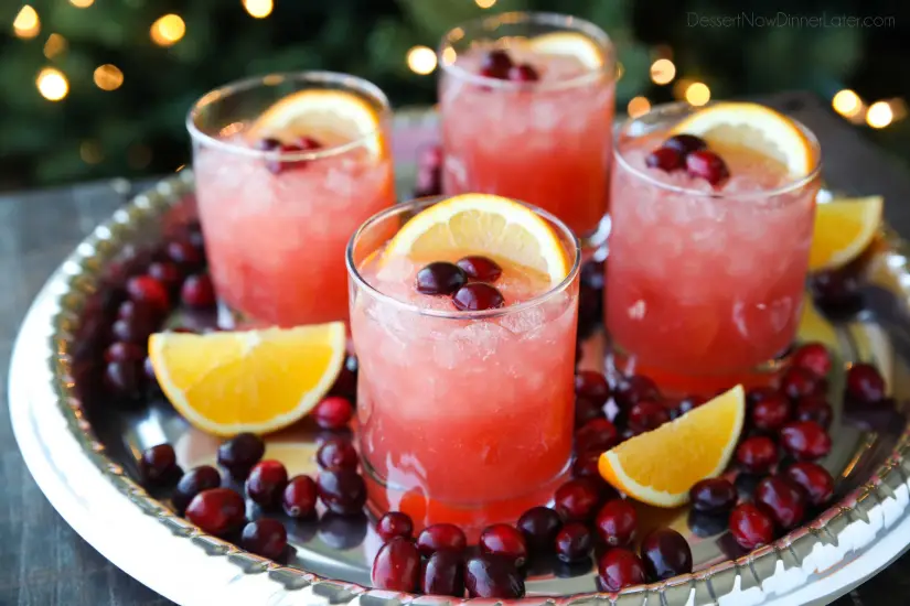 This non-alcoholic Cranberry Orange Mocktail is an easy and refreshing fruit punch drink for the holidays. It's fizzy, fruity, and only 3 ingredients!