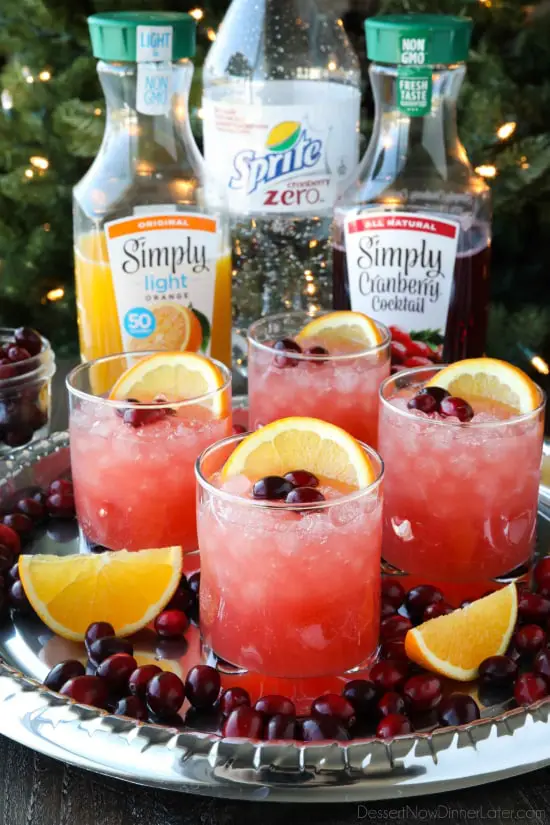 This non-alcoholic Cranberry Orange Mocktail is an easy and refreshing fruit punch drink for the holidays. It's fizzy, fruity, and only 3 ingredients!