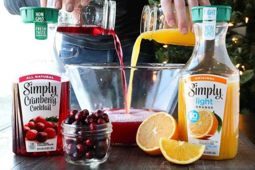 This non-alcoholic Cranberry Orange Mocktail is an easy and refreshing fruit punch drink for the holidays. It's fizzy, fruity, and only 3 ingredients!