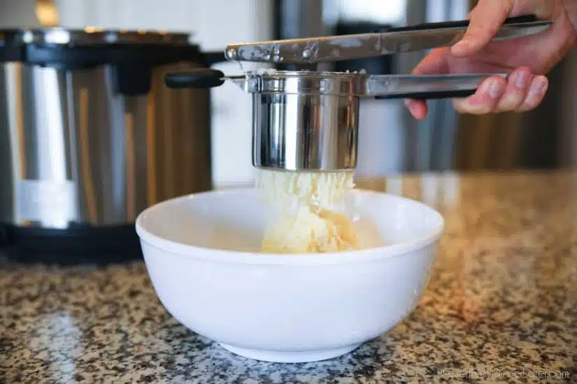 Lightened-up Creamy Cauliflower and Mashed Potatoes is a healthier side dish, with half cauliflower and half potatoes. Velvety smooth and creamy with less carbs and no milk, sour cream, or butter. Delicious enough for Thanksgiving or Christmas, yet simple enough for any dinner.