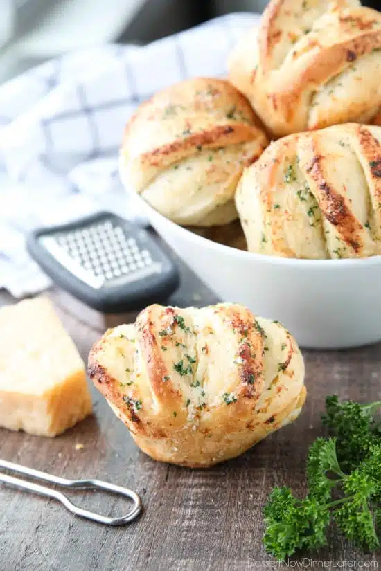 These easy Garlic Parmesan Rolls have layers of flavor to pull apart and savor in every bite. The perfect dinner rolls for holidays or any meal. You'll love these shortcut butterflake rolls. 