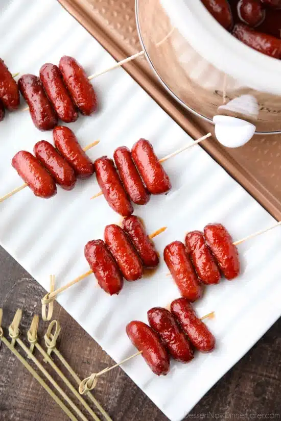 Crockpot Little Smokies is an easy appetizer for parties, the big game, or holidays. Only three ingredients and a slow cooker is all you need for these cocktail sausages. The sweet and tangy sauce is great on meatballs too! 