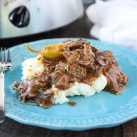 This flavorful Mississippi Pot Roast is a great make-ahead freezer meal. It's slow cooked in the crock pot to create tender shredded beef in a saucy gravy. Serve it with mashed potatoes, rice, or noodles.