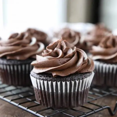 This is the BEST Chocolate Cream Cheese Frosting! Silky smooth and creamy, yet thick and sturdy enough for piping on cakes or cupcakes. It’s super easy to make and not too sweet.