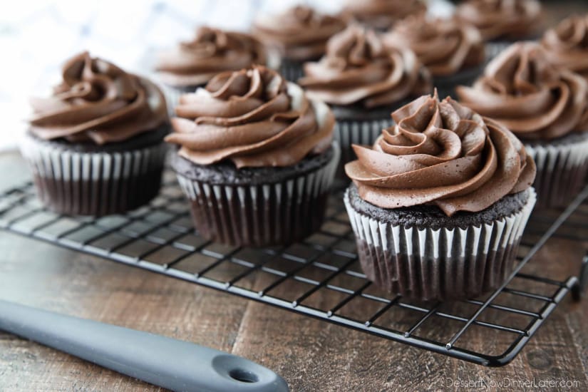 Chocolate Cream Cheese Frosting piped on top of chocolate cupcakes.