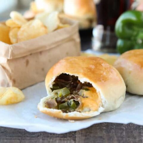 Philly Cheesesteak Bombs are easy to make with pre-made dough that's stuffed with meat, veggies, and two kinds of cheese! A tasty game day appetizer, or hot pocket sandwich for dinner!