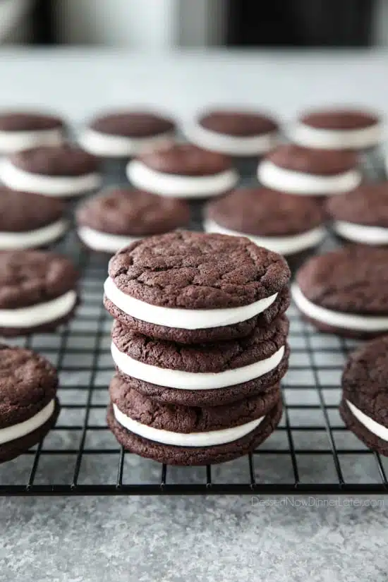 These easy Homemade Oreos are made completely from scratch. Soft, fudgy (brownie-like) chocolate cookies are stuffed with a simple, vanilla cream filling. (Cream Cheese Frosting recipe also available for Oreo filling.)