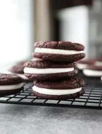 These easy Homemade Oreos are made completely from scratch. Soft, fudgy chocolate cookies are stuffed with a simple, vanilla cream filling. (Cream Cheese Frosting recipe also available for filling.)