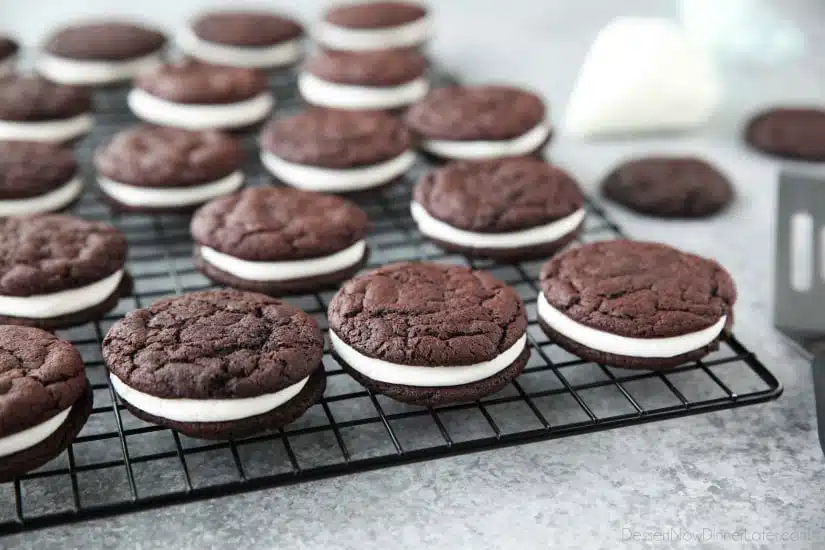 These easy Homemade Oreos are made completely from scratch. Soft, fudgy (brownie-like) chocolate cookies are stuffed with a simple, vanilla cream filling. (Cream Cheese Frosting recipe also available for Oreo filling.)