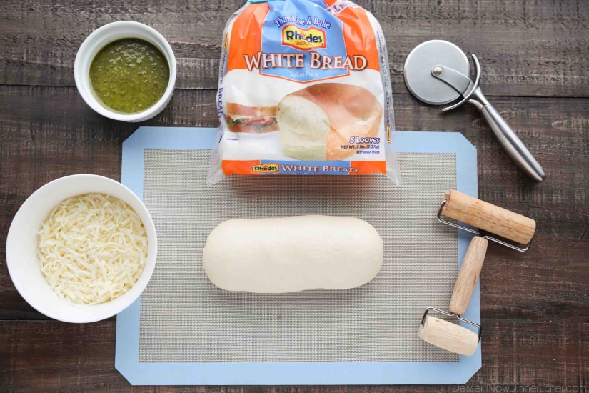 Ingredients for Easy Pesto Breadsticks -- Rhodes White Bread, Pesto, and Shredded Mozzarella.