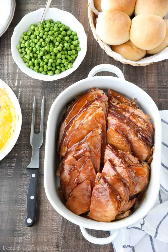 Brown Sugar Mustard Glazed Ham is super easy to make with only a few common ingredients for a thick, sticky glaze. No pre-cooking the glaze. Just mix, slather, and bake. It's the easiest holiday ham!