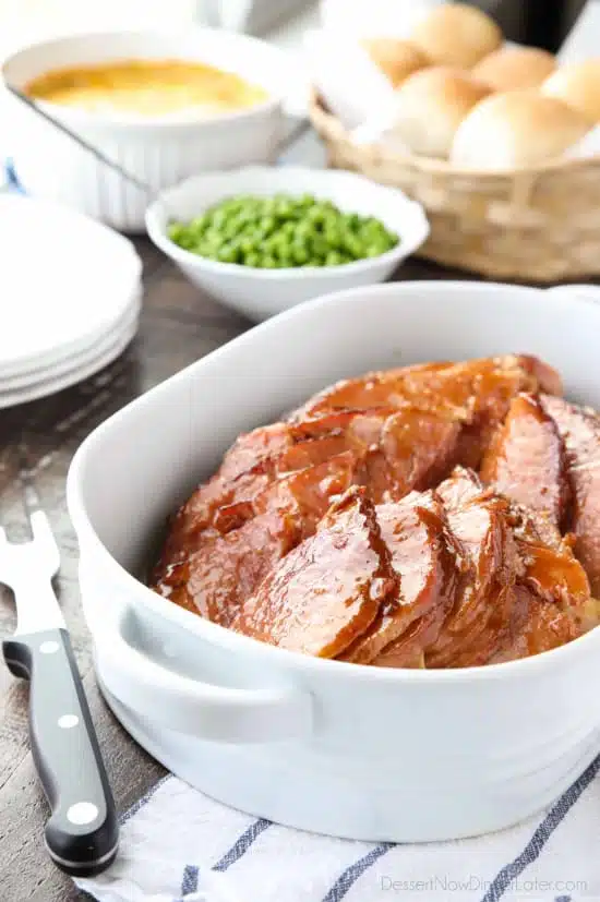 Brown Sugar Mustard Glazed Ham is super easy to make with only a few common ingredients for a thick, sticky glaze. No pre-cooking the glaze. Just mix, slather, and bake. It's the easiest holiday ham!