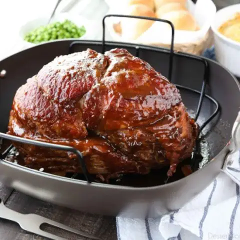 Brown Sugar Mustard Glazed Ham is super easy to make with only a few common ingredients for a thick, sticky glaze. No pre-cooking the glaze. Just mix, slather, and bake. It's the easiest holiday ham!