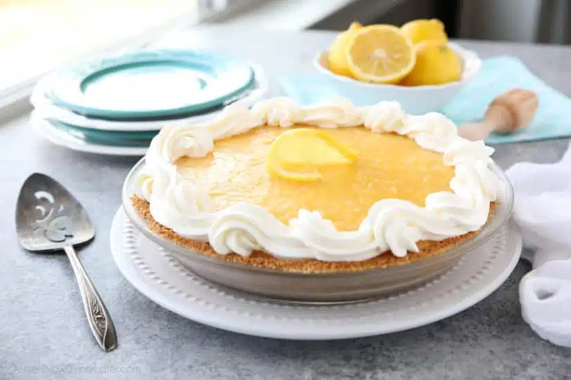 Lemon Cream Cheese Pie has layers of no-bake cheesecake and an easy microwave lemon curd inside of a vanilla wafer crust. It’s the perfect combination of sweet and tart. A great dessert for spring, Easter, or summer!