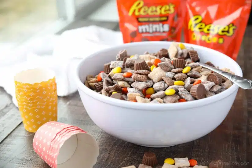 Reese's Muddy Buddies are a twist on the classic with both chocolate and peanut butter coated cereal pieces tossed together with Reese's Pieces and Reese's Minis. This is the ultimate peanut butter and chocolate puppy chow snack mix.