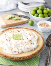 Coconut Key Lime Pie has coconut in the crust, cream of coconut in the key lime filling, and toasted coconut on top! A tropical dessert that's creamy, sweet, and tart.﻿
