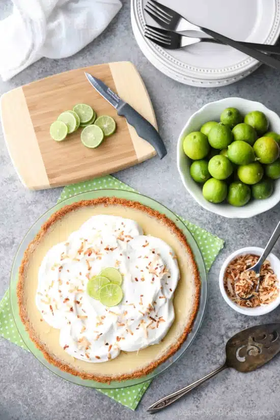 Coconut Key Lime Pie has coconut in the crust, cream of coconut in the key lime filling, and toasted coconut on top! A tropical dessert that's creamy, sweet, and tart.