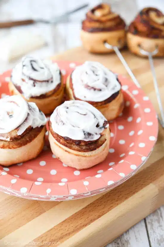 Campfire Cinnamon Rolls are cooked on a stick over a fire or grill. As easy as a can of biscuits, but with real yeast dough instead! The best cinnamon rolls you will ever have while camping!