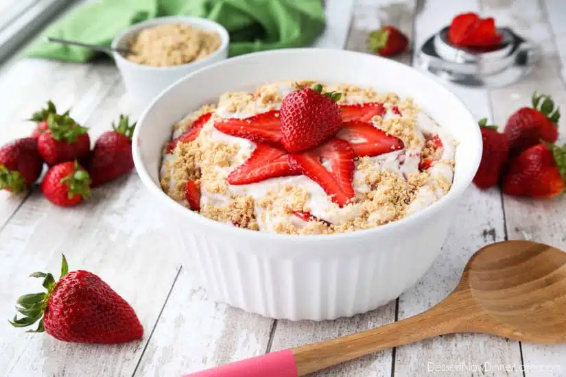 Strawberry Cheesecake Salad is loaded with cream cheese, jello pudding, yogurt, fresh strawberries, and whipped topping then sprinkled with a graham cracker crust. It's a delicious potluck salad, fluff salad, or decadent fruit salad that doubles as a dessert.