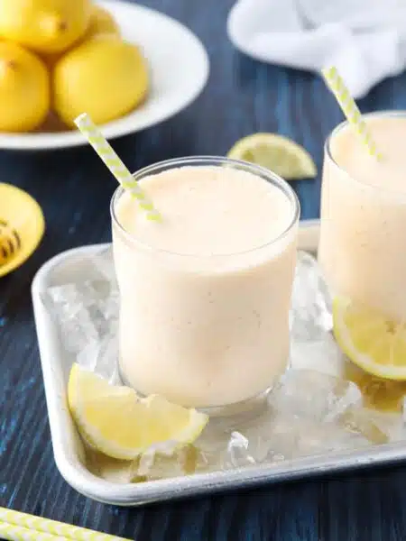 This copycat Chick-Fil-A frosted lemonade recipe is creamy and sweet with the wonderful tang of lemon. A delicious frozen drink that turns lemonade into a fruit milkshake. Perfect for summer!﻿