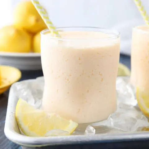 This copycat Chick-Fil-A frosted lemonade recipe is creamy and sweet with the wonderful tang of lemon. A delicious frozen drink that turns lemonade into a fruit milkshake. Perfect for summer!﻿