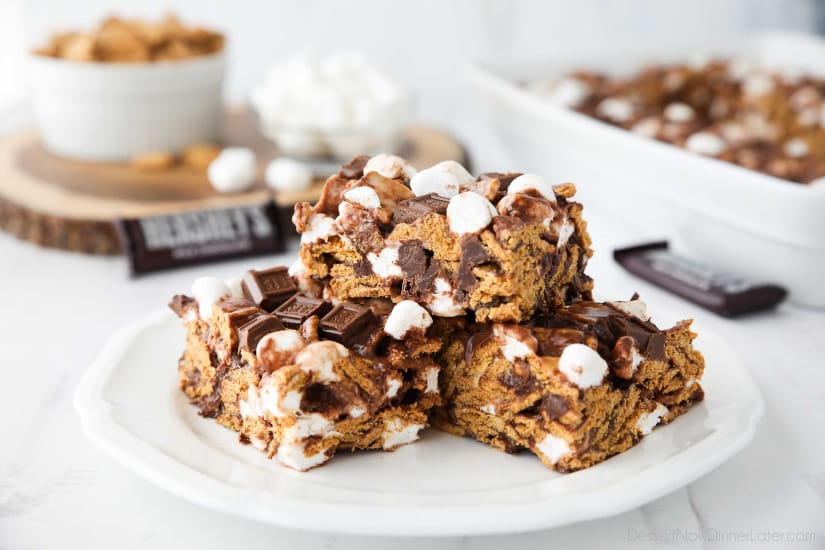 S'mores Krispie Treats have all the flavors of traditional s'mores made into an easy no-bake summer dessert. Loaded with Golden Grahams cereal, plenty of marshmallows and chocolate, these indoor s'mores bars are a crowd favorite.