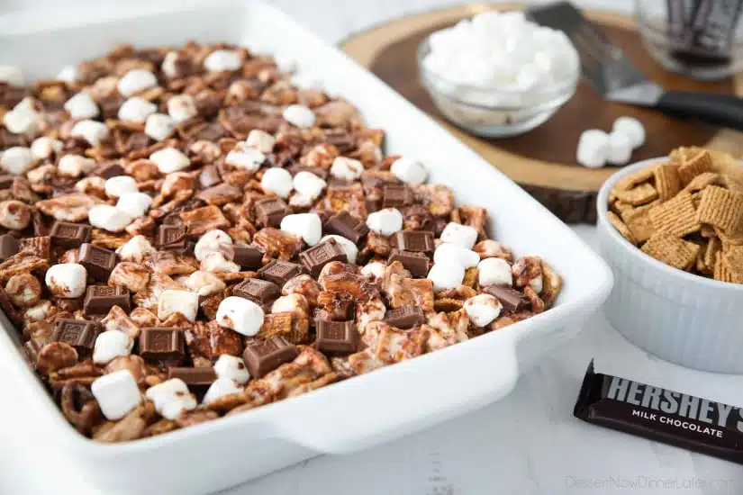 S'mores Krispie Treats have all the flavors of traditional s'mores made into an easy no-bake summer dessert. Loaded with Golden Grahams cereal, plenty of marshmallows and chocolate, these indoor s'mores bars are a crowd favorite.