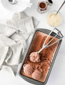 Chocolate Malt Ice Cream turns your favorite milkshake into a summer dessert you can enjoy by the scoop! This no-cook, egg free, easy homemade chocolate ice cream is combined with malted milk powder for that good old-fashioned taste.