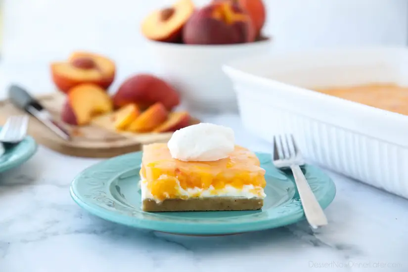 This Peaches and Cream Dessert has a pecan shortbread crust, no-bake cheesecake filling, and fresh peach layer on top. It's a delicious light and fruity summer dessert.