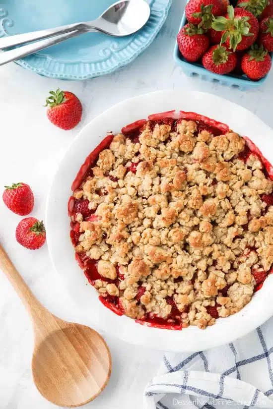 Strawberry Crisp (aka Strawberry Crumble) - Fresh, juicy strawberries are topped with a buttery brown sugar and oat crumb topping. Enjoy this summer dessert warm with a scoop of vanilla ice cream on top! 