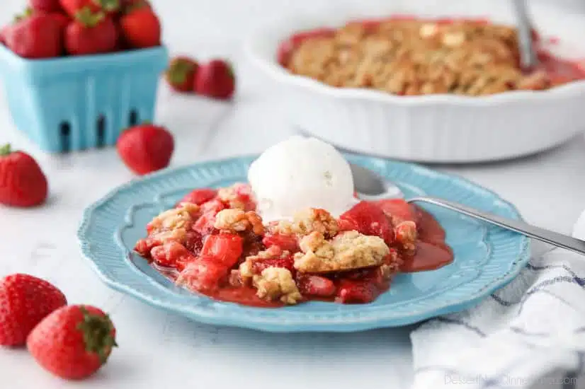 Strawberry Crisp (aka Strawberry Crumble) - Fresh, juicy strawberries are topped with a buttery brown sugar and oat crumb topping. Enjoy this summer dessert warm with a scoop of vanilla ice cream on top! 