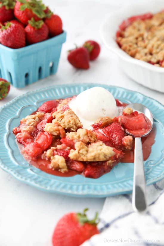 Strawberry Crisp (aka Strawberry Crumble) - Fresh, juicy strawberries are topped with a buttery brown sugar and oat crumb topping. Enjoy this summer dessert warm with a scoop of vanilla ice cream on top! 