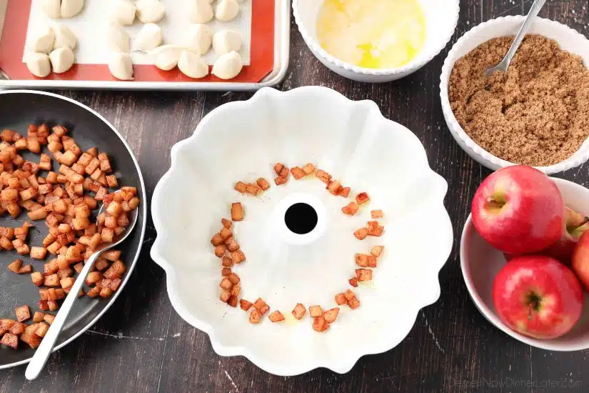 Apple Fritter Monkey Bread - Use a bundt pan and start with a layer of caramelized apple pieces.