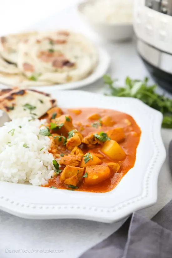 Instant Pot Indian Butter Chicken is quick, easy, creamy and flavorful. Chunks of chicken and potatoes are smothered in a mild tomato and coconut milk sauce that's filled with fragrant Indian spices. Serve it with some garlic naan for a restaurant quality dinner at home.