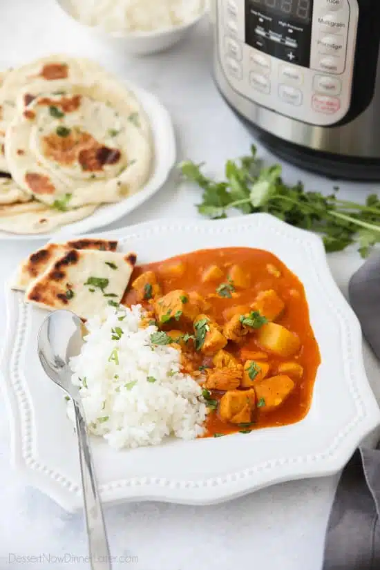 Instant Pot Indian Butter Chicken is quick, easy, creamy and flavorful. Chunks of chicken and potatoes are smothered in a mild tomato and coconut milk sauce that's filled with fragrant Indian spices. Serve it with some garlic naan for a restaurant quality dinner at home.