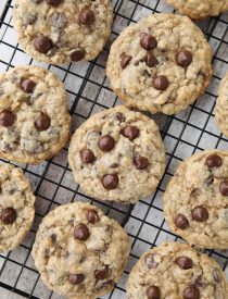 These Oatmeal Chocolate Chip Cookies are thick, soft, and chewy, with plenty of hearty old fashioned oats and creamy chocolate chips. An easy classic recipe.