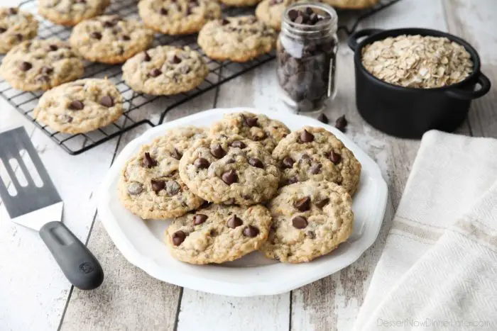 These Oatmeal Chocolate Chip Cookies are thick, soft, and chewy, with plenty of hearty old fashioned oats and creamy chocolate chips. An easy classic recipe.