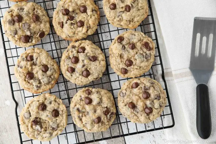 These Oatmeal Chocolate Chip Cookies are thick, soft, and chewy, with plenty of hearty old fashioned oats and creamy chocolate chips. An easy classic recipe.