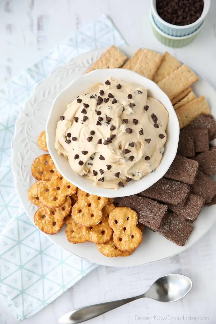 This buckeye dip recipe uses all the ingredients of your favorite buckeye peanut butter balls. With cream cheese, and mini chocolate chips, it's an easy, smooth and creamy dip. Serve it with pretzels, honey and chocolate graham crackers, or even apples. This dip is perfect for parties, holidays, or game day!