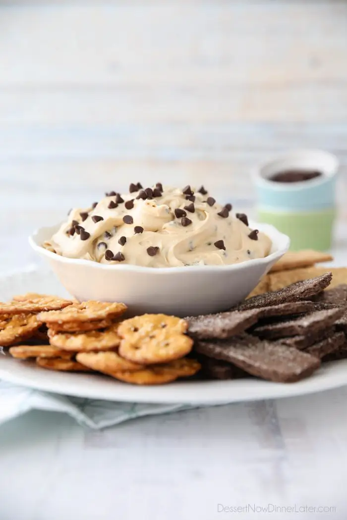 This buckeye dip recipe with cream cheese and mini chocolate chips is an easy, smooth, and creamy dip fashioned after buckeye peanut butter balls.
