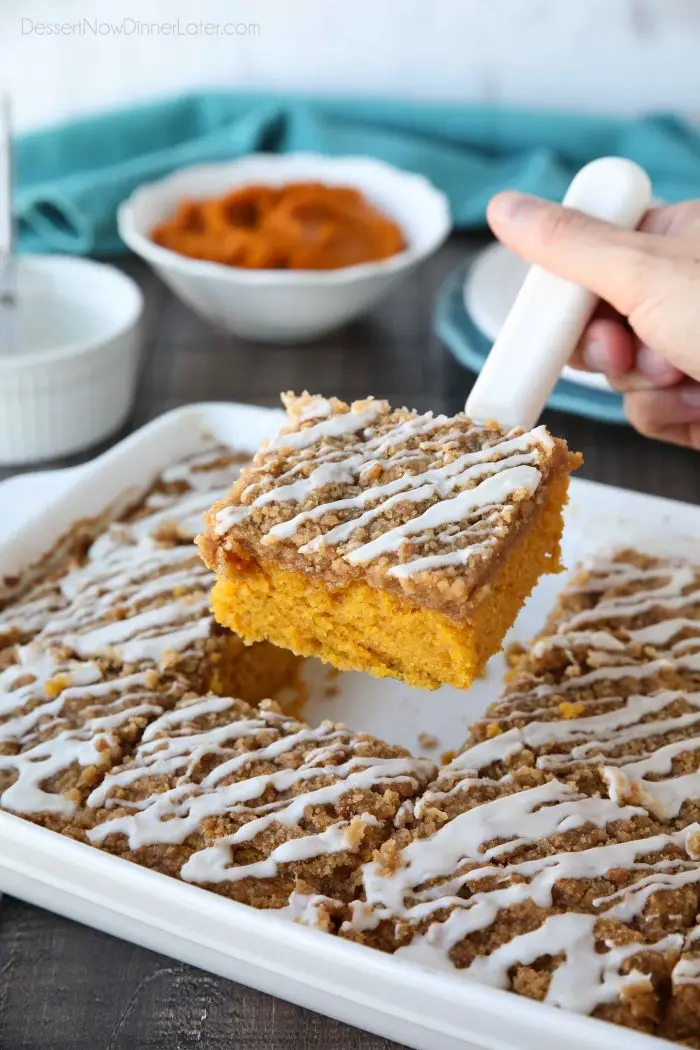 Pumpkin Spice Coffee Cake is easy to make and full of real pumpkin. It's moist, yet light and fluffy, with a cinnamon crumb topping and pumpkin spice icing drizzle on top.