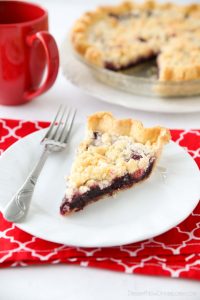 Cherry Crumb Pie can be made with fresh or frozen cherries, flavored with a hint of almond extract, and topped with a sweet crumble topping. Easy and delicious!