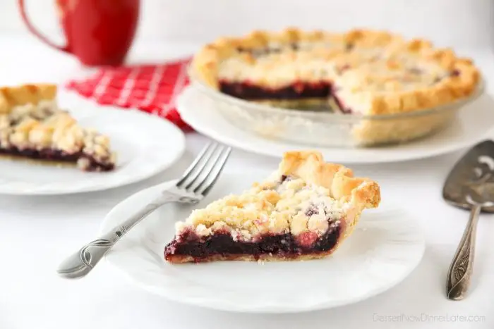 Cherry Crumb Pie can be made with fresh or frozen cherries, flavored with a hint of almond extract, and topped with a sweet crumble topping. Easy and delicious!