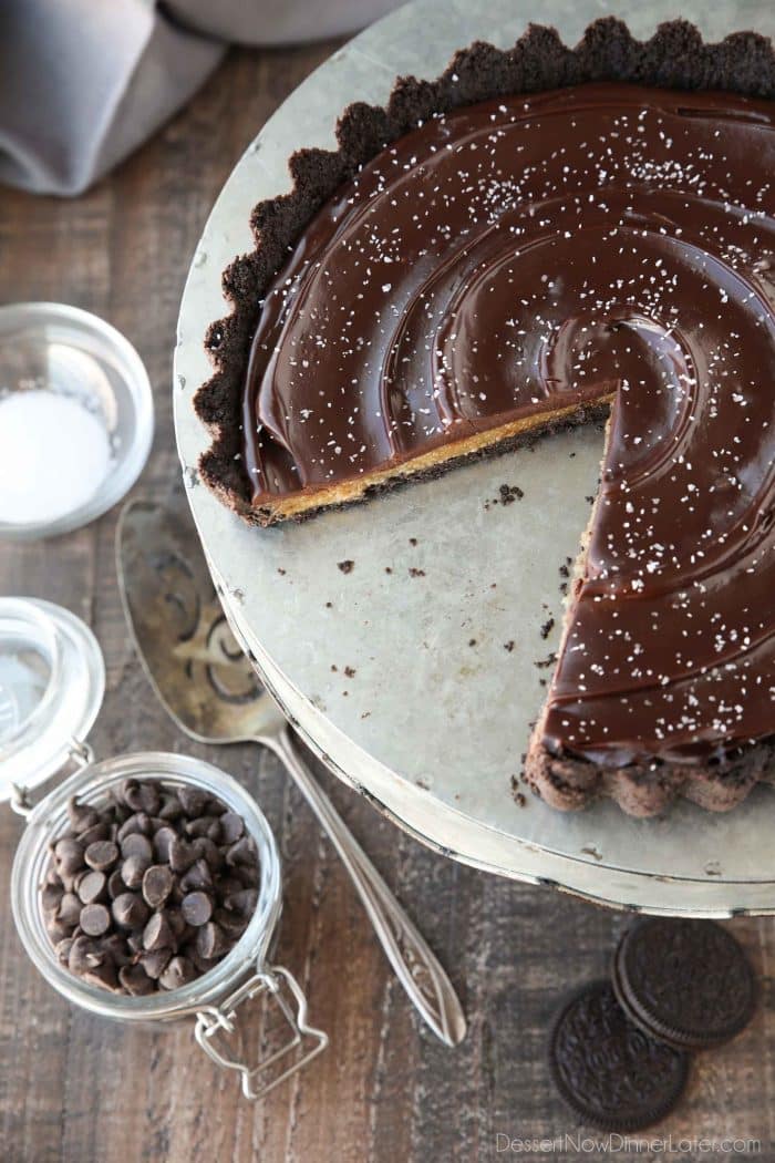 This easy Chocolate Caramel Tart has an Oreo cookie crust, soft caramel filling, and creamy chocolate ganache topped with flaky kosher salt.