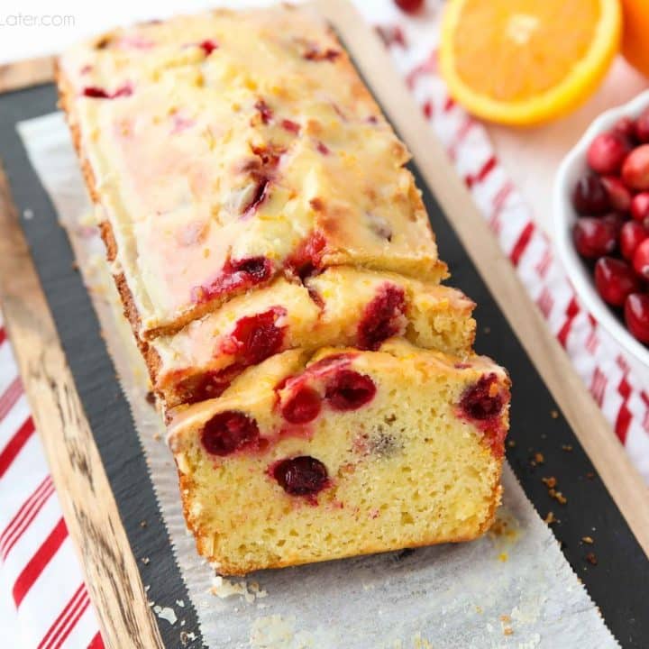 Cranberry Orange Bread is a wonderful treat for the holidays, with a sweet orange glaze on top and pops of tart cranberries throughout.