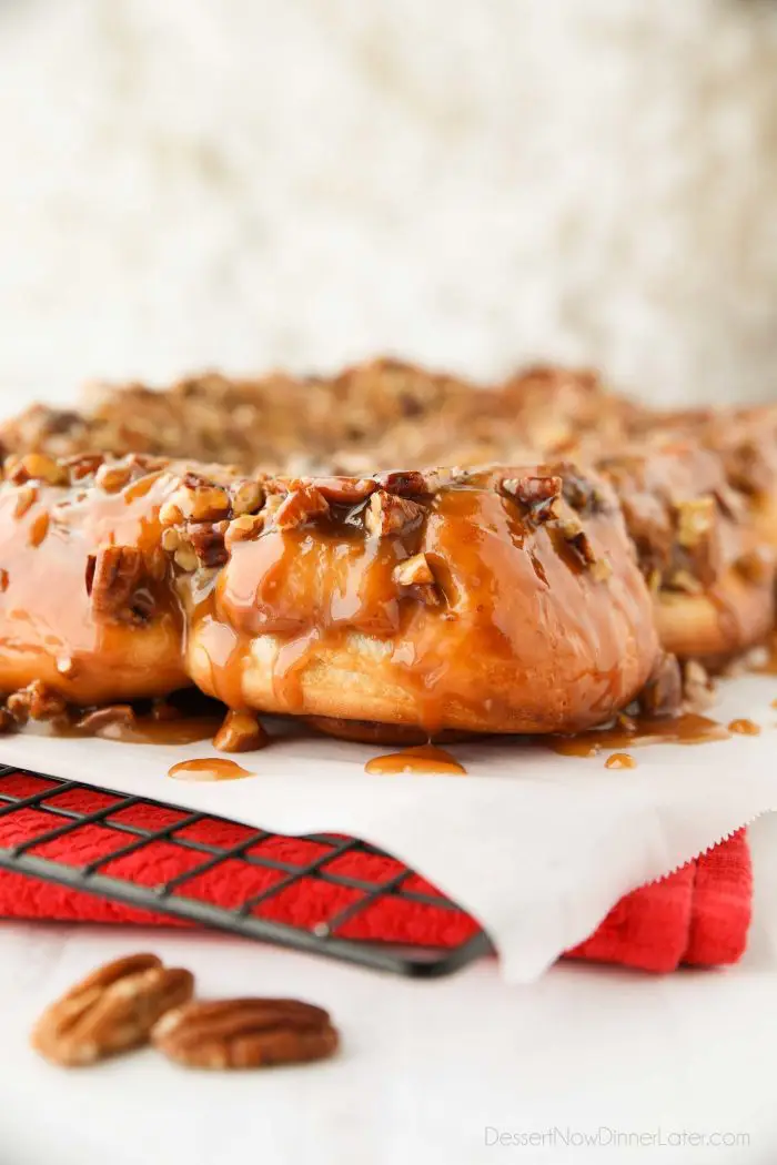 These easy caramel pecan rolls are so sticky, gooey, and delicious. They're made with frozen cinnamon rolls so half the work is done for you! Perfect for holidays or weekends.