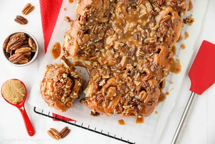 These easy caramel pecan rolls are so sticky, gooey, and delicious. They're made with frozen cinnamon rolls so half the work is done for you! Perfect for holidays or weekends.